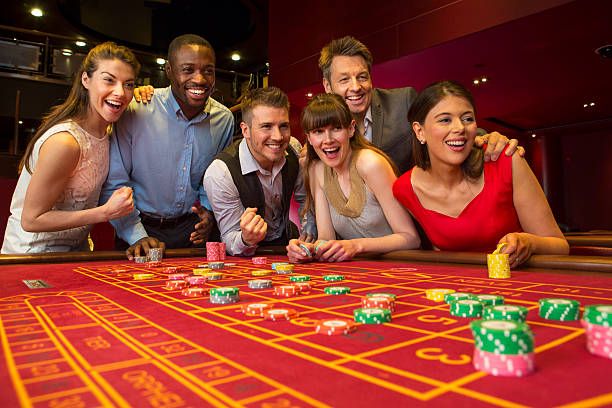 Sic Bo table with transparent dome, three dice, and professional dealer managing live round